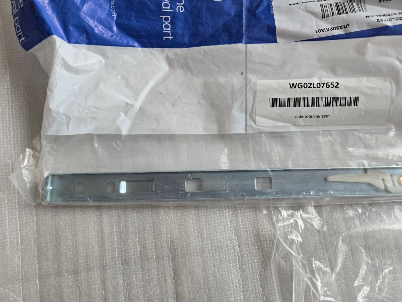 Genuine General Electric GE Slider Internal Assy P/N WB63X23859